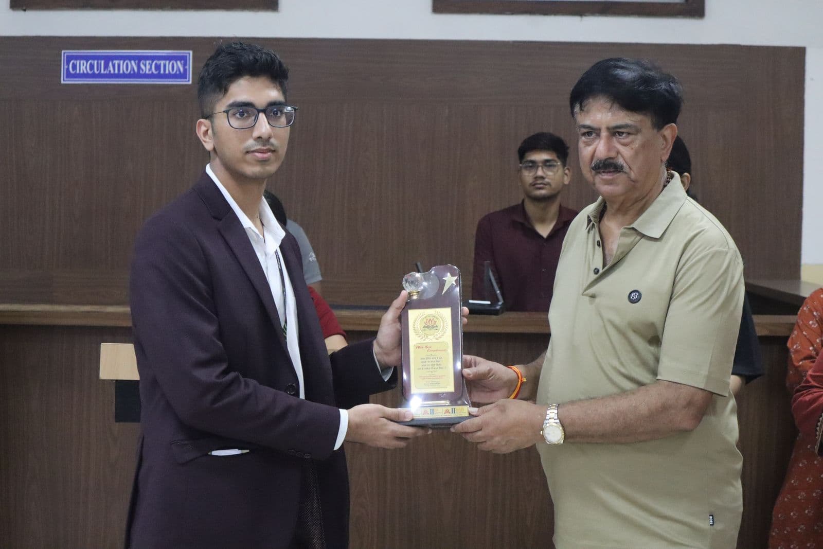 Akshat Sharma receiving the Mentor's Award from the Director General of the Indore Institute of Science and Technology